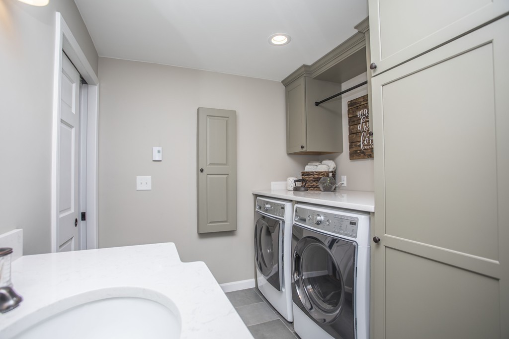 648 County Road Wareham, MA 02576 - Photo 21 of 30 a en suite bathroom with a sink a washer and dryer