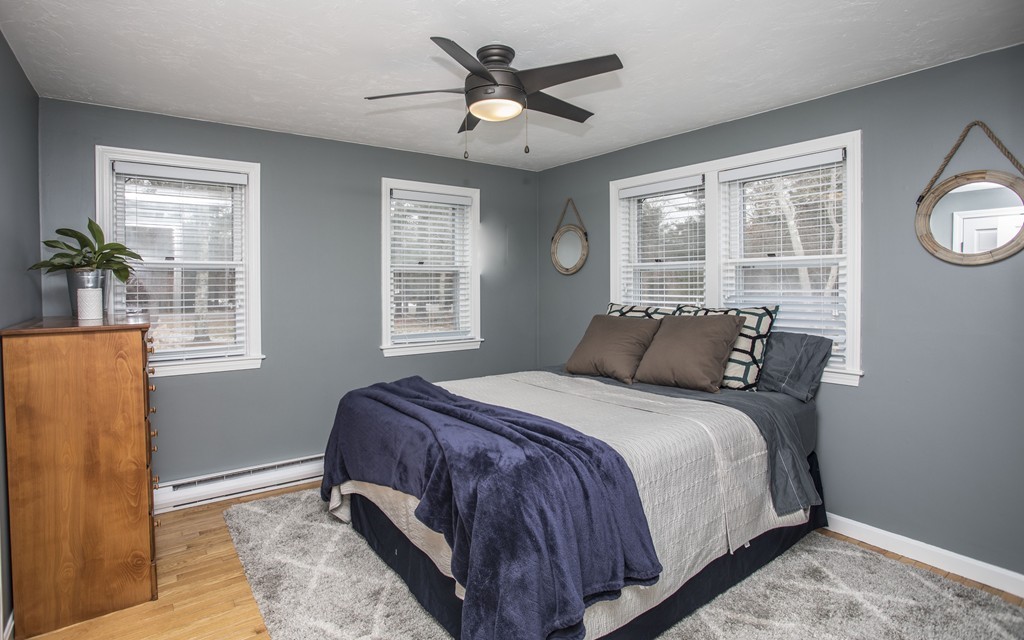 648 County Road Wareham, MA 02576 - Photo 22 of 30 a bed sitting in a bedroom next to a window