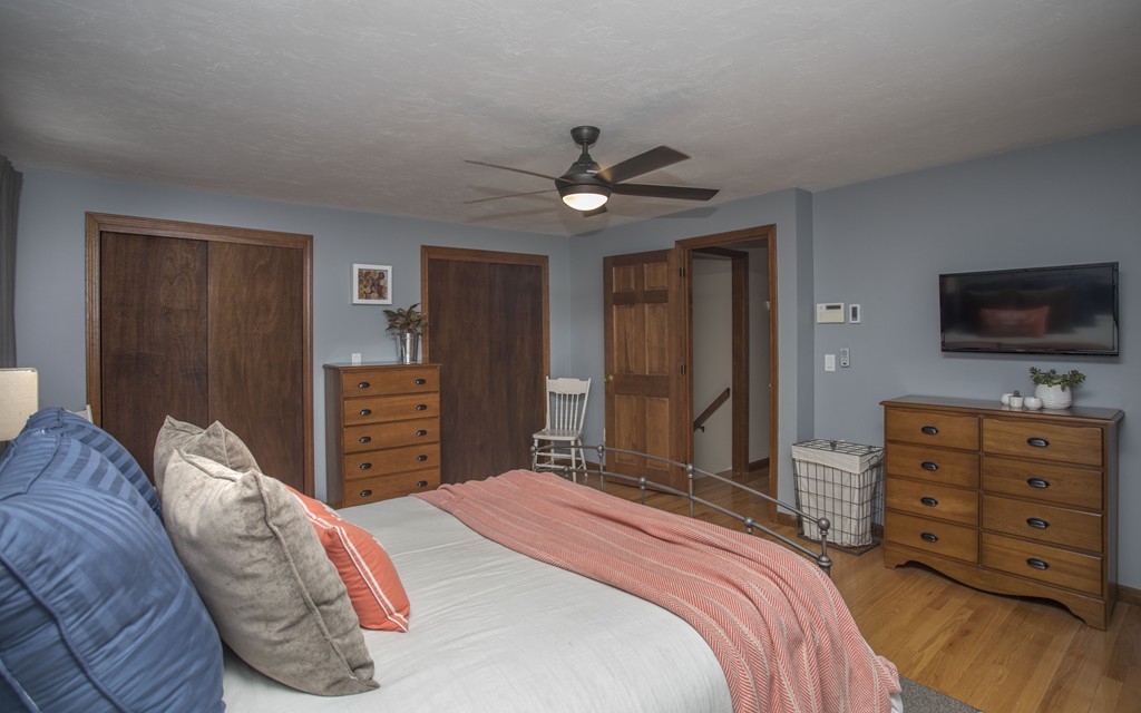 648 County Road Wareham, MA 02576 - Photo 26 of 30 a bedroom with a bed a dresser and a television