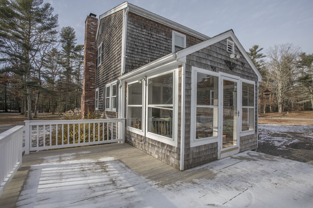 648 County Road Wareham, MA 02576 - Photo 7 of 30 a view of a wooden deck with a yard