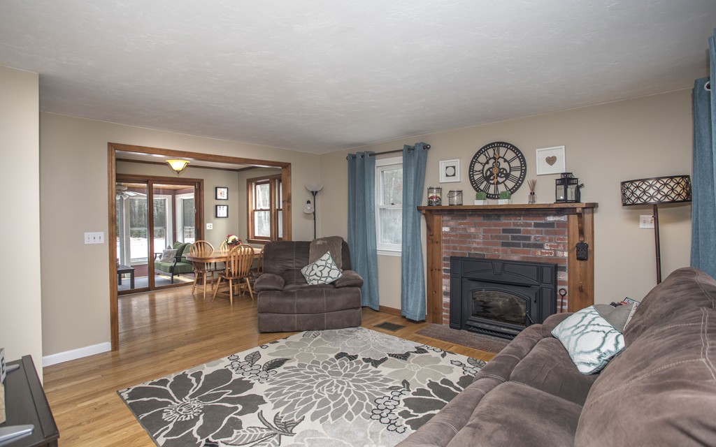 648 County Road Wareham, MA 02576 - Photo 8 of 30 a living room with furniture and a fireplace
