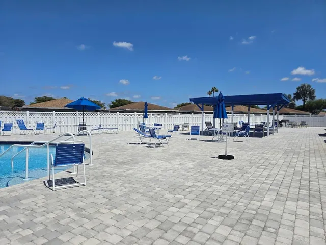 a view of a terrace with sitting area