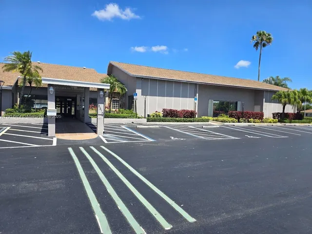 a front view of a building with street