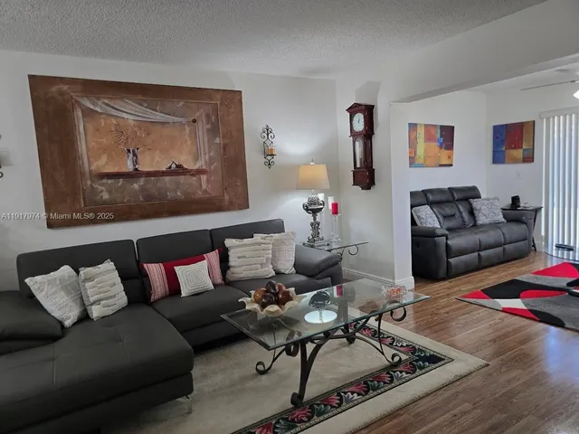 a living room with furniture and a couch