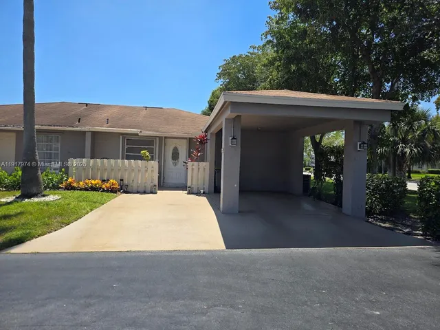 a view of houses with outdoor area and