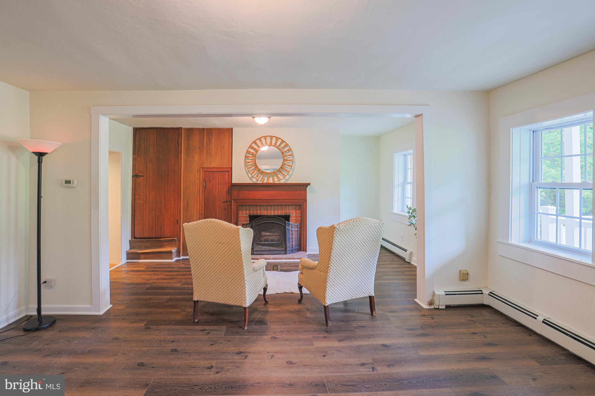 19020 Gunpowder Road Hampstead, MD 21074 - Photo 43 of 109 Living room w/built-ins and wood fireplace