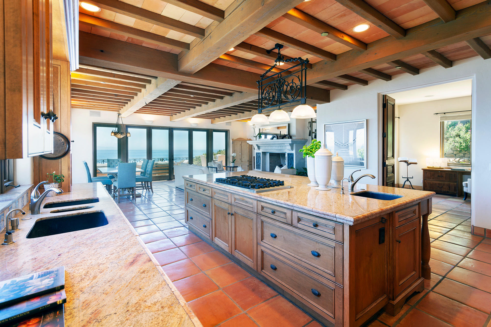 4045 Bajada Lane Santa Barbara, CA 93110 - Photo 11 of 32 a large kitchen with kitchen island a large island in it