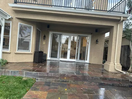 a large kitchen with stainless steel appliances lots of counter space and breakfast area