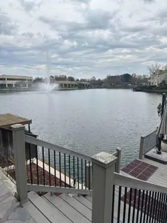 a terrace with a lake view