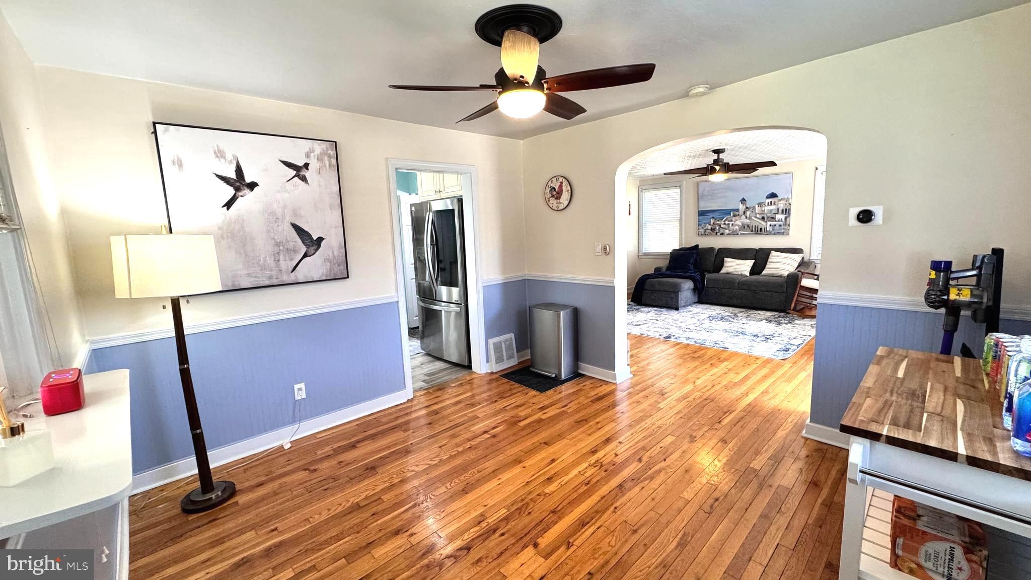 1029 Lamb Road Secane, PA 19018 - Photo 13 of 78 a living room with furniture and a wooden floor