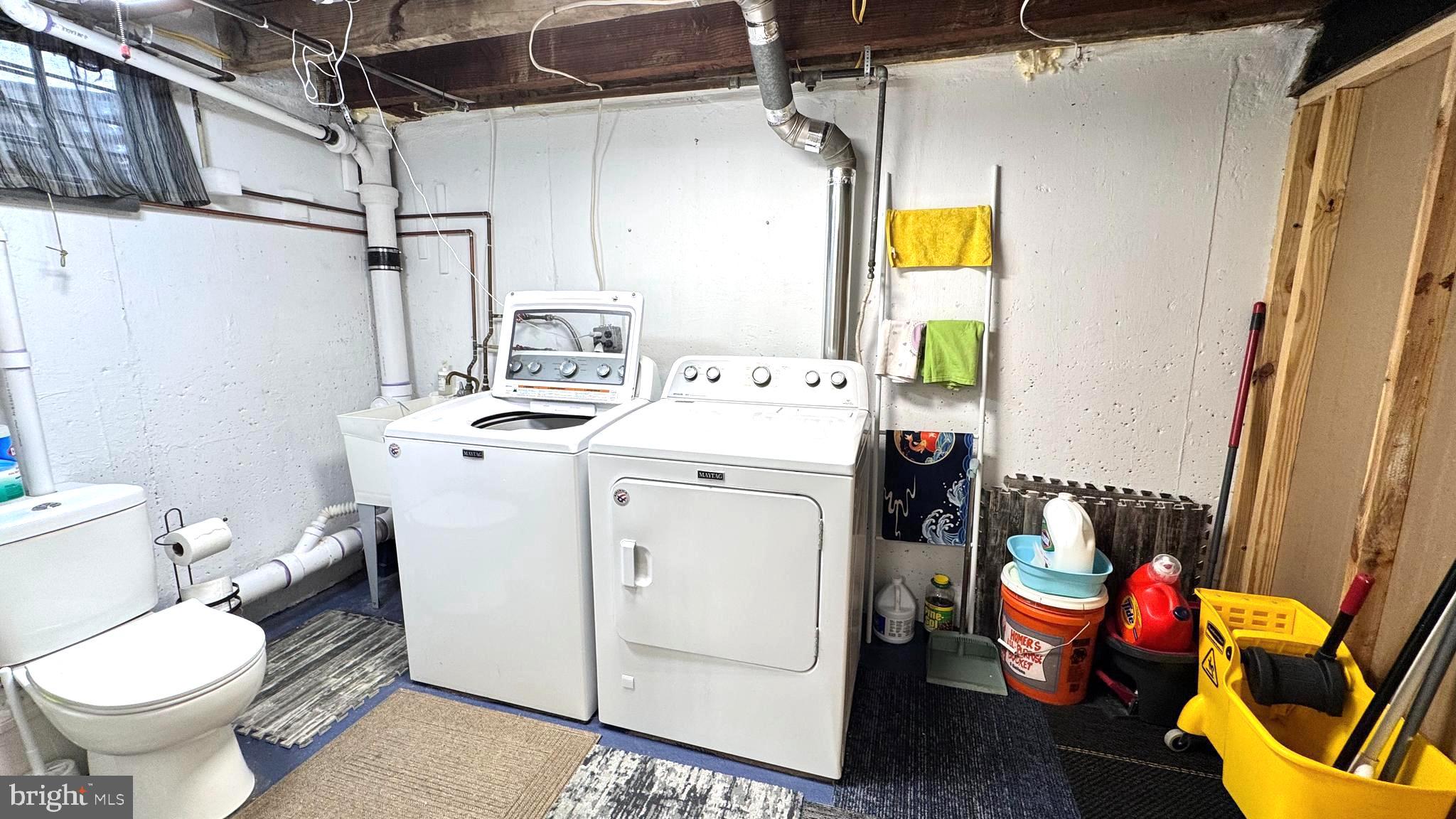 1029 Lamb Road Secane, PA 19018 - Photo 26 of 78 a utility room with dryer and washer