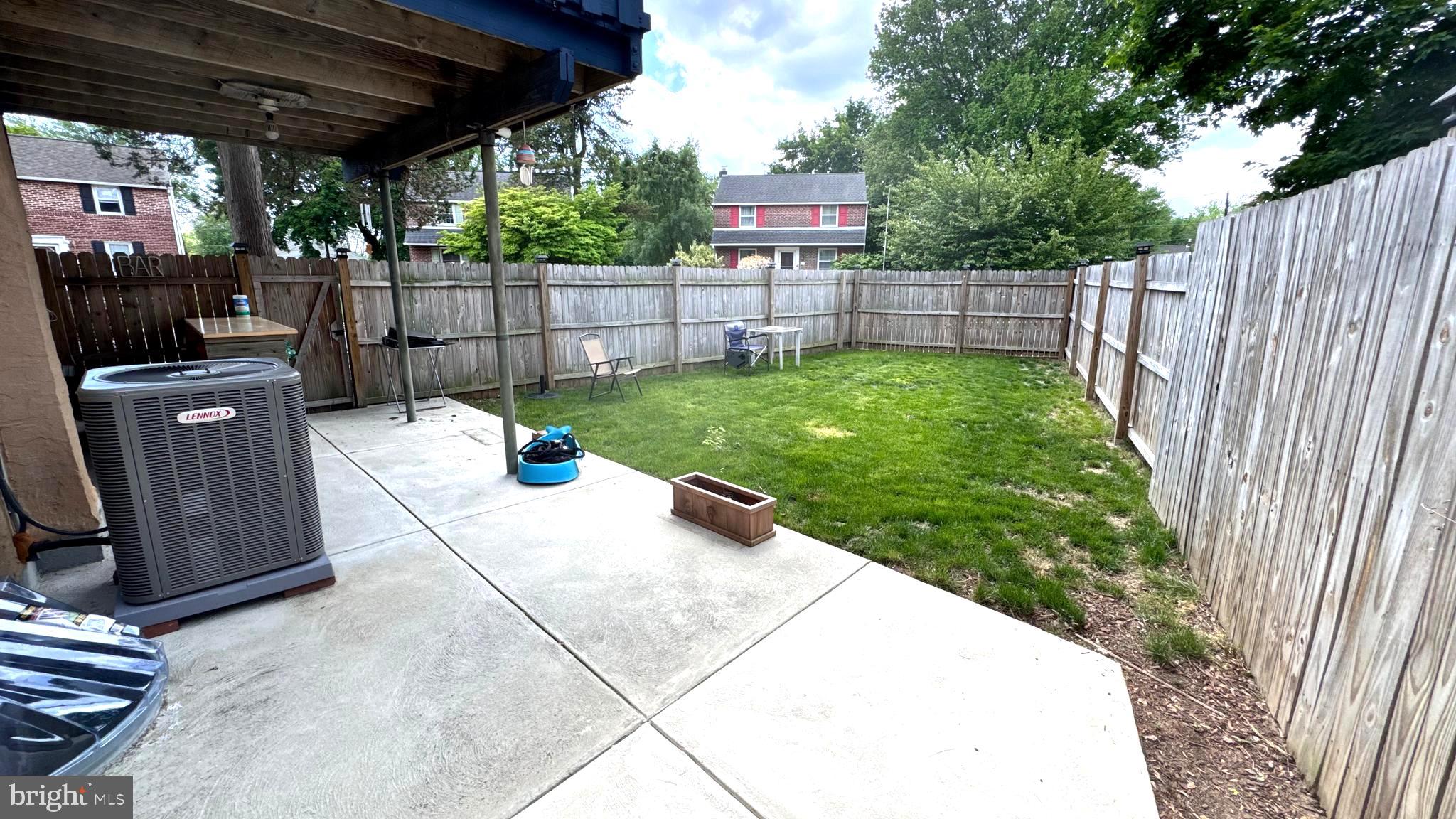 1029 Lamb Road Secane, PA 19018 - Photo 57 of 78 a view of a backyard with wooden fence