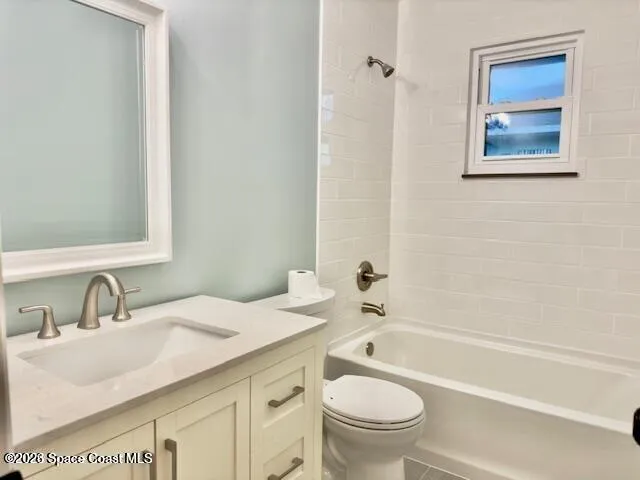 a bathroom with a sink a toilet and a bathtub