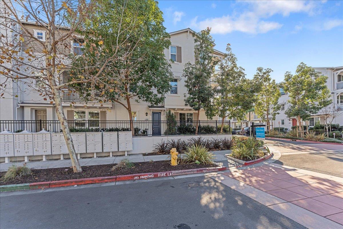 a view of a house with a street