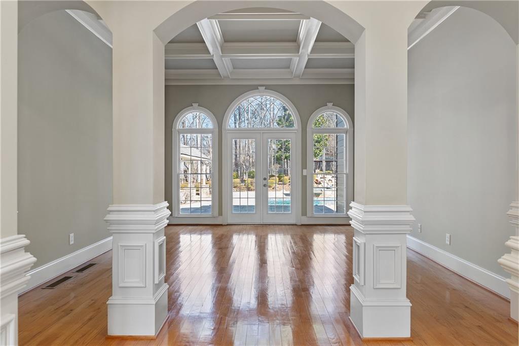 5300 Hill Road Acworth, GA 30101 - Photo 15 of 100 a view of a hallway with wooden floor and a fireplace