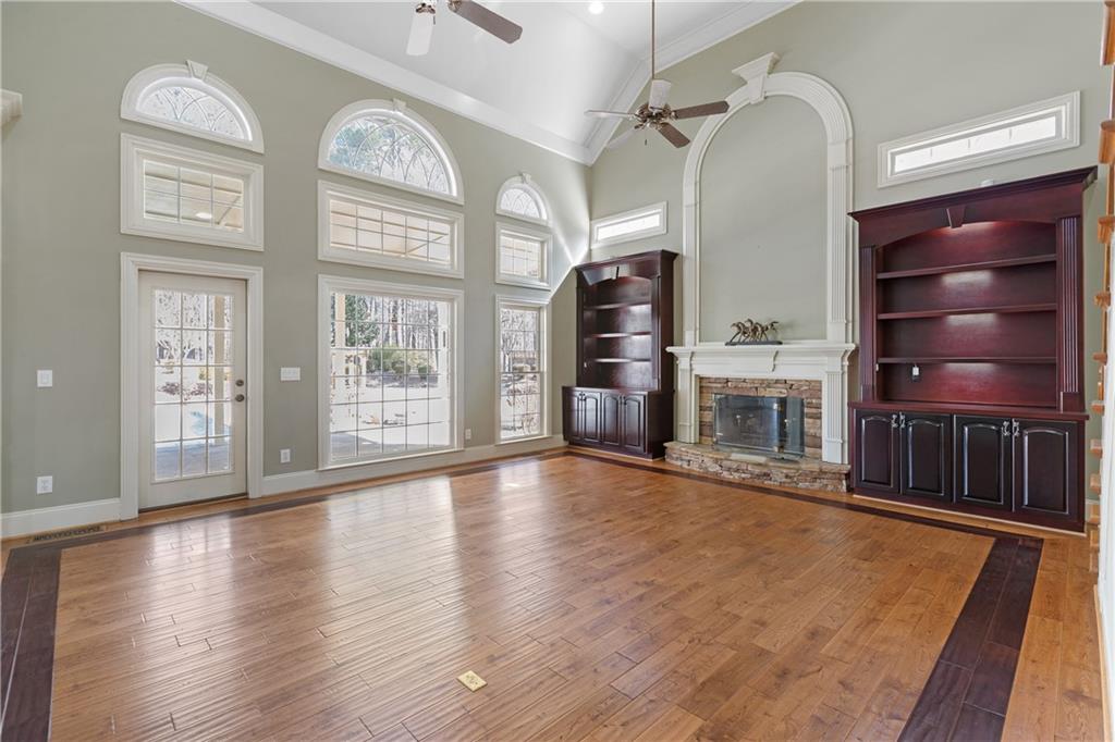 5300 Hill Road Acworth, GA 30101 - Photo 18 of 100 a view of an empty room with a window and wooden floor
