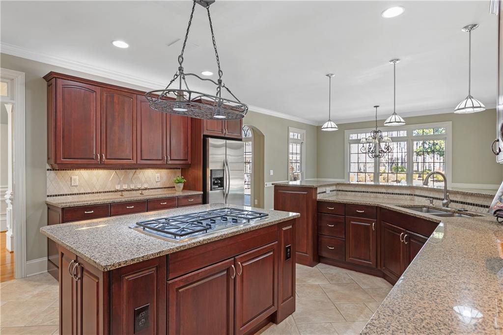 5300 Hill Road Acworth, GA 30101 - Photo 28 of 100 a kitchen with a sink a stove a counter space and a window