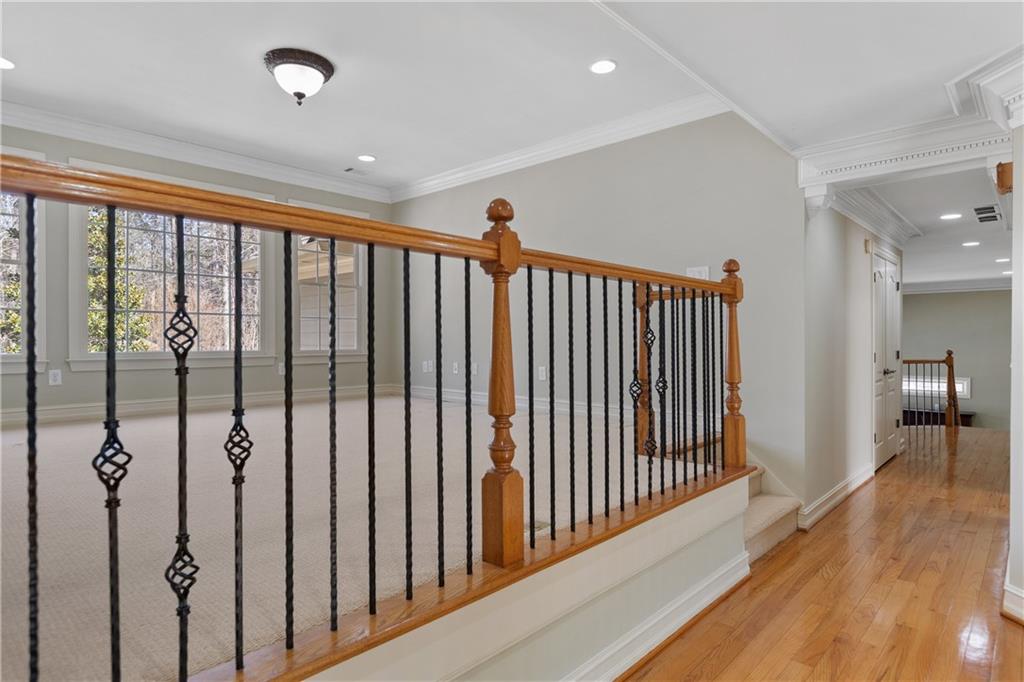 5300 Hill Road Acworth, GA 30101 - Photo 46 of 100 a view of a hallway with wooden floor and staircase