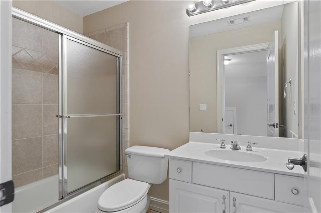 5300 Hill Road Acworth, GA 30101 - Photo 63 of 100 a bathroom with a sink toilet and shower