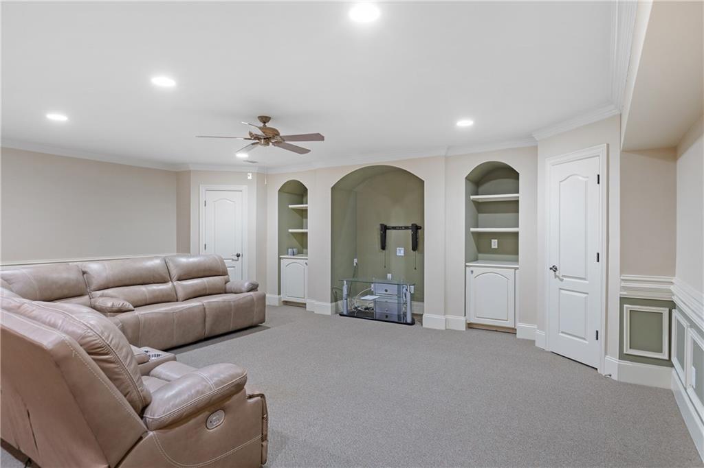 5300 Hill Road Acworth, GA 30101 - Photo 69 of 100 a living room with furniture and a chandelier