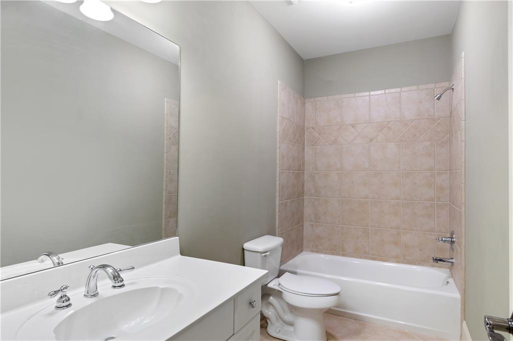 5300 Hill Road Acworth, GA 30101 - Photo 72 of 100 a bathroom with a sink a toilet and shower