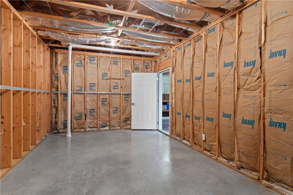 5300 Hill Road Acworth, GA 30101 - Photo 75 of 100 a view of an empty room with wooden walls