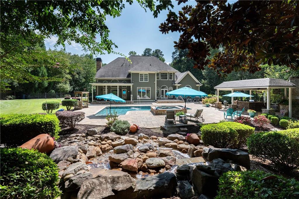 5300 Hill Road Acworth, GA 30101 - Photo 94 of 100 a front view of a house with garden