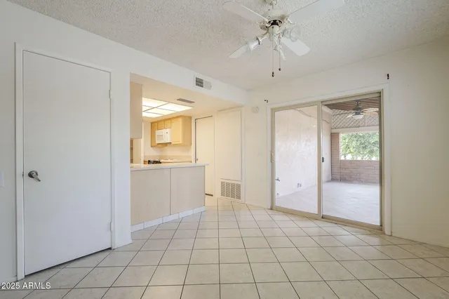 a view of an empty room and window