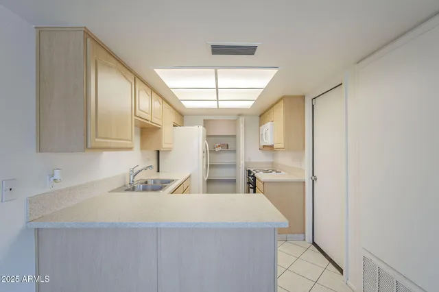 a bathroom with a sink a mirror and a bathtub