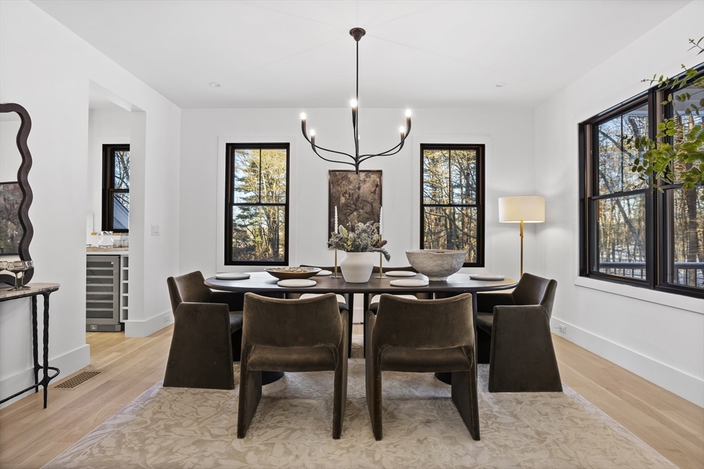 236 Fairhaven Road Concord, MA 01742 - Photo 12 of 35 a view of a dining room with furniture window and outside view