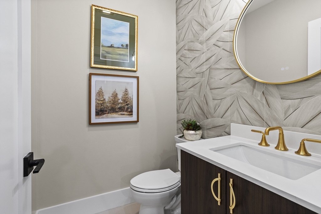 236 Fairhaven Road Concord, MA 01742 - Photo 16 of 35 a bathroom with a sink and a mirror