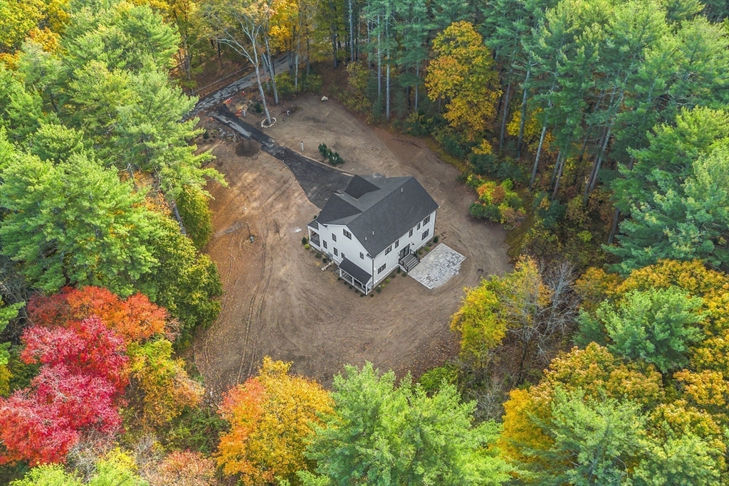 236 Fairhaven Road Concord, MA 01742 - Photo 27 of 35 an aerial view of a house with a yard and swimming pool
