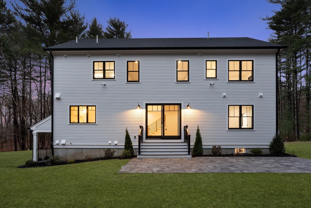 236 Fairhaven Road Concord, MA 01742 - Photo 30 of 35 a front view of a house with a yard