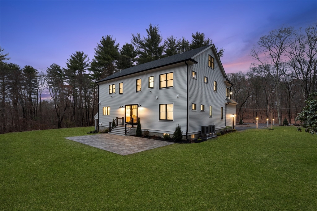 236 Fairhaven Road Concord, MA 01742 - Photo 31 of 35 a front view of a house with a yard