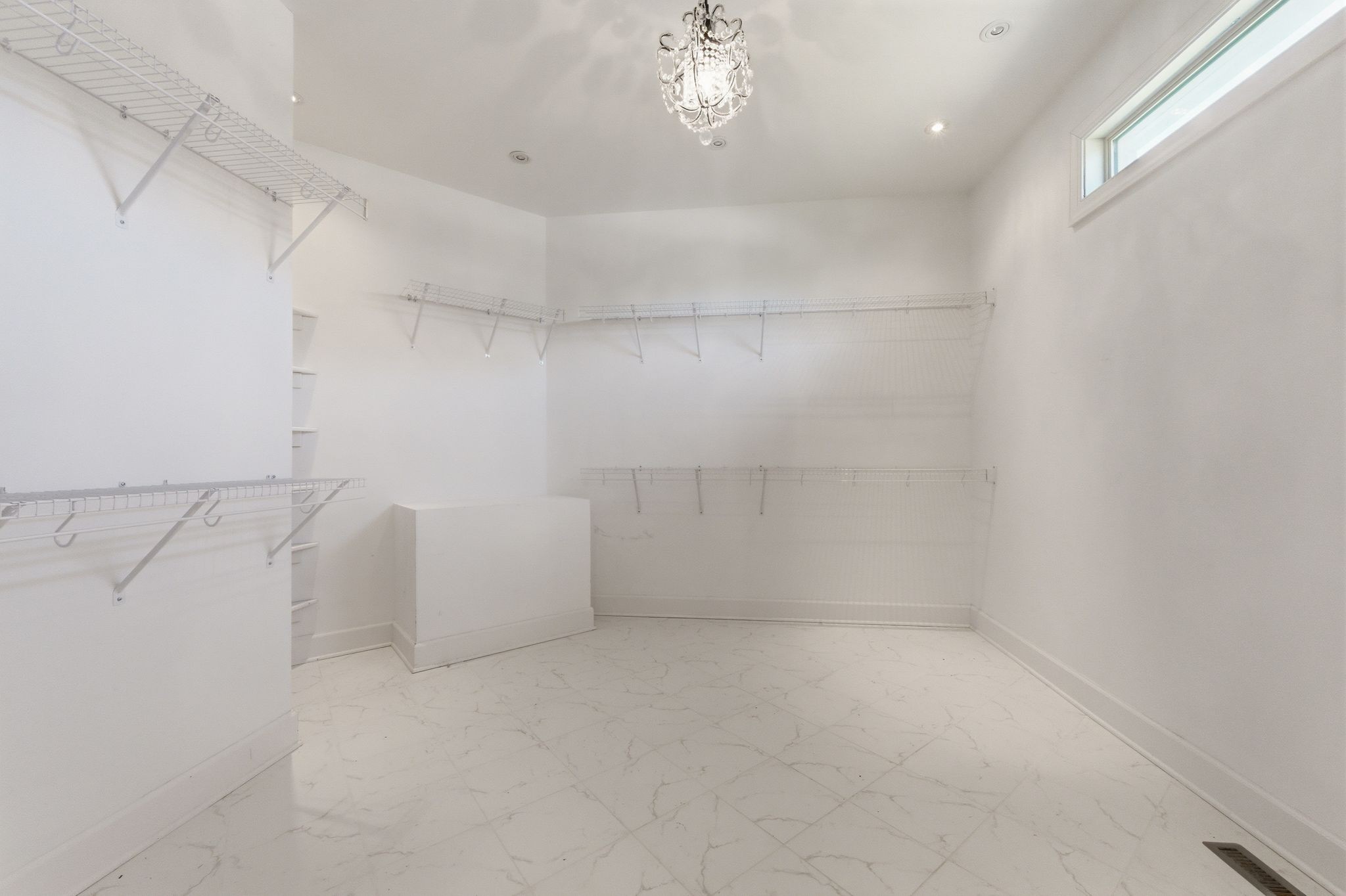 528 Country Club Drive Dickson, TN 37055 - Photo 41 of 55 a view of a room with racks on the wall
