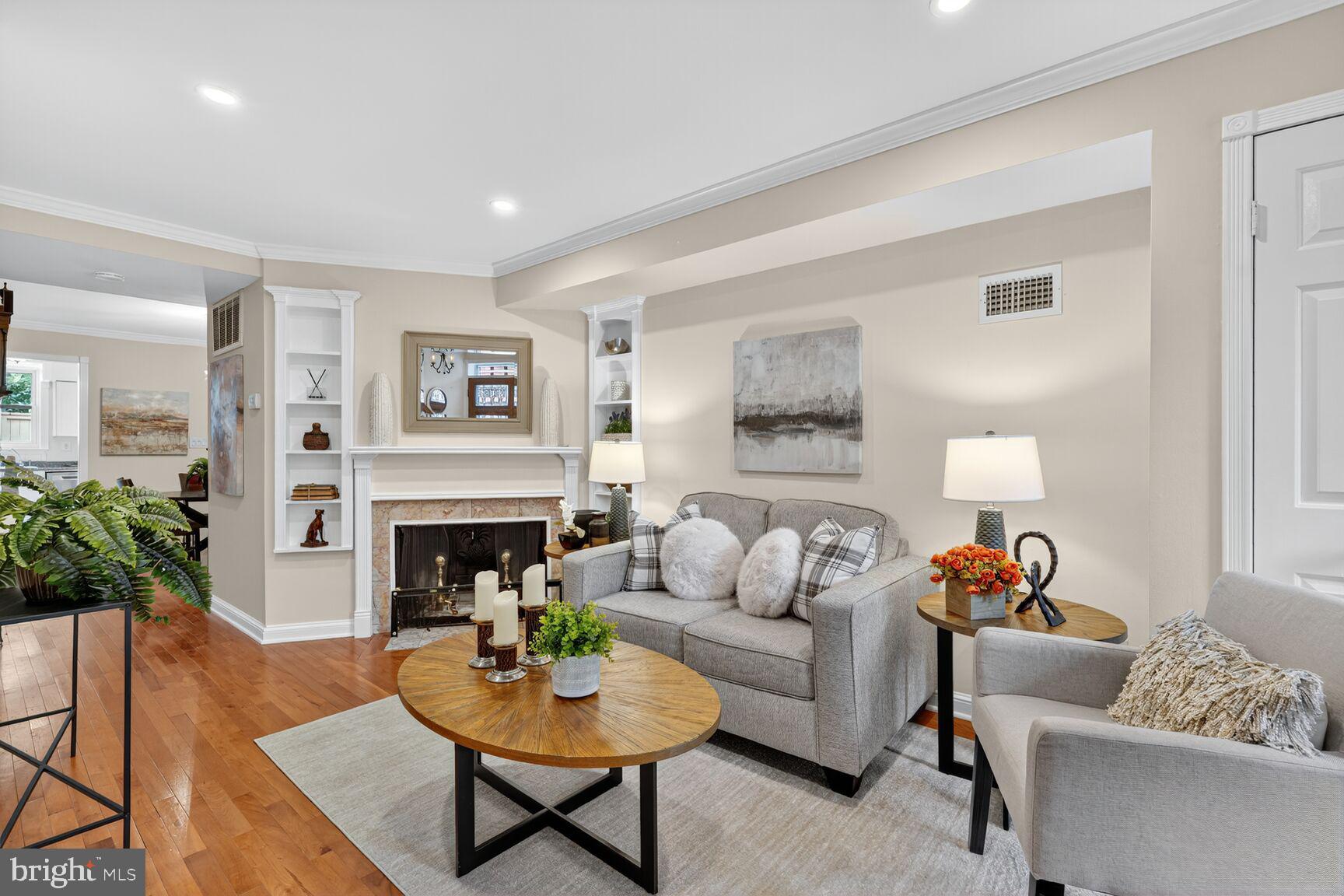 1410 C Street Southeast Washington, DC 20003 - Photo 4 of 19 Bookshelves and wood burning fireplace