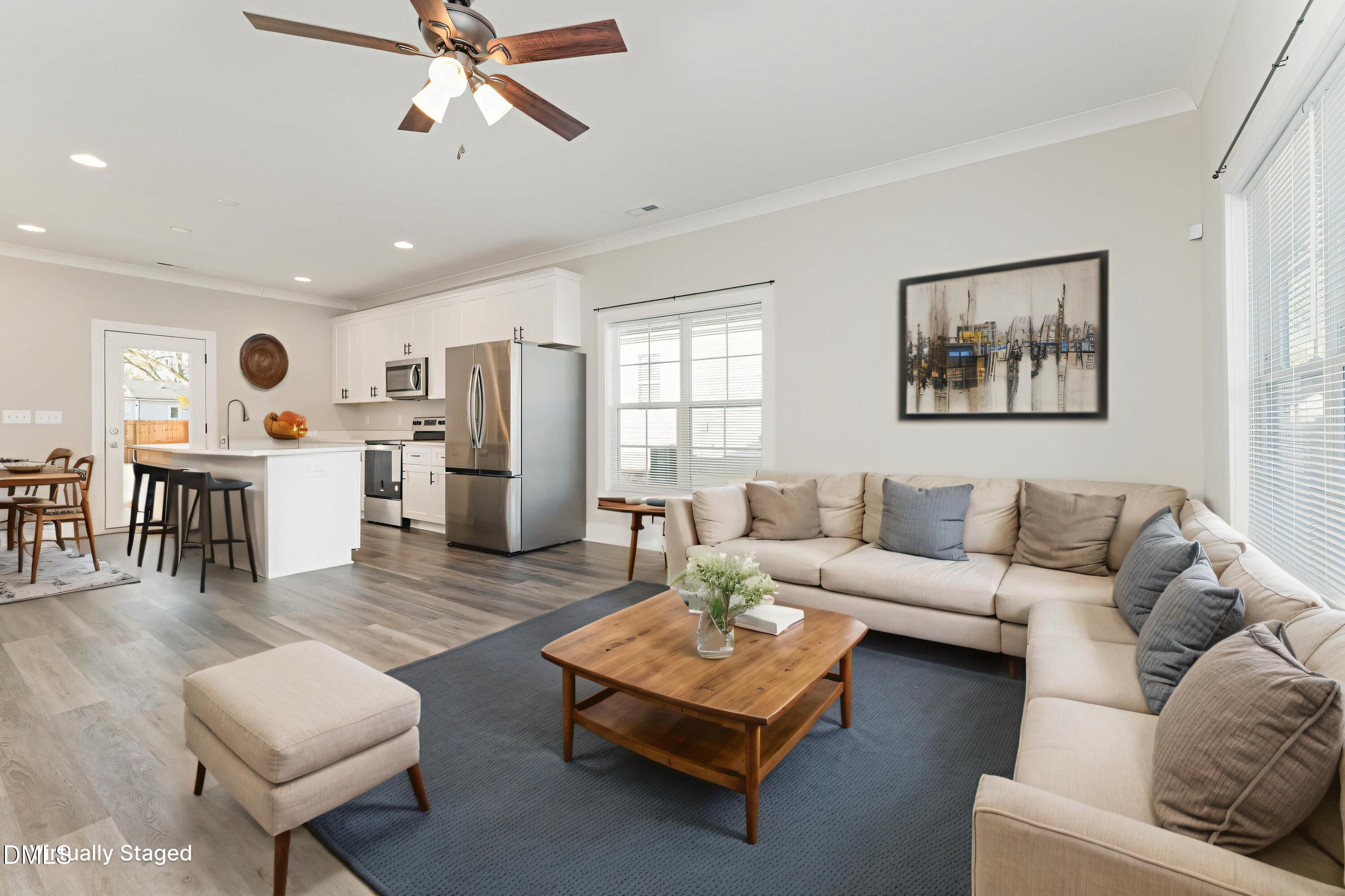 903 West Anderson Street, Unit 1/2 Selma, NC 27576 - Photo 6 of 36 a living room with furniture and kitchen view