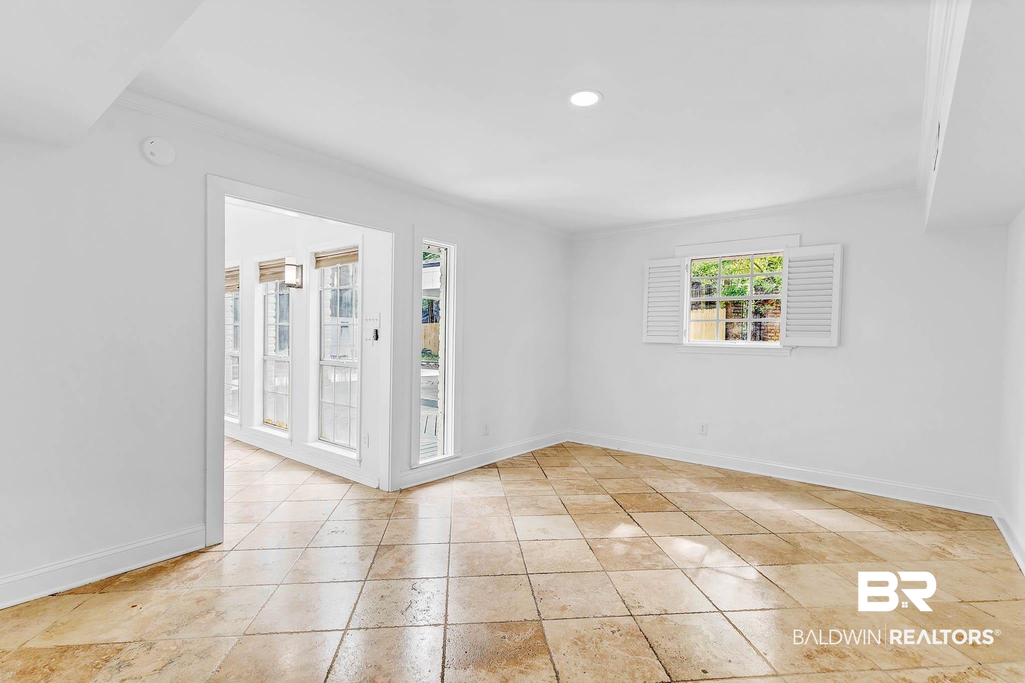 4705 Sherry Court Mobile, AL 36693 - Photo 24 of 100 Unfurnished room with recessed lighting, crown molding, and light tile patterned floors