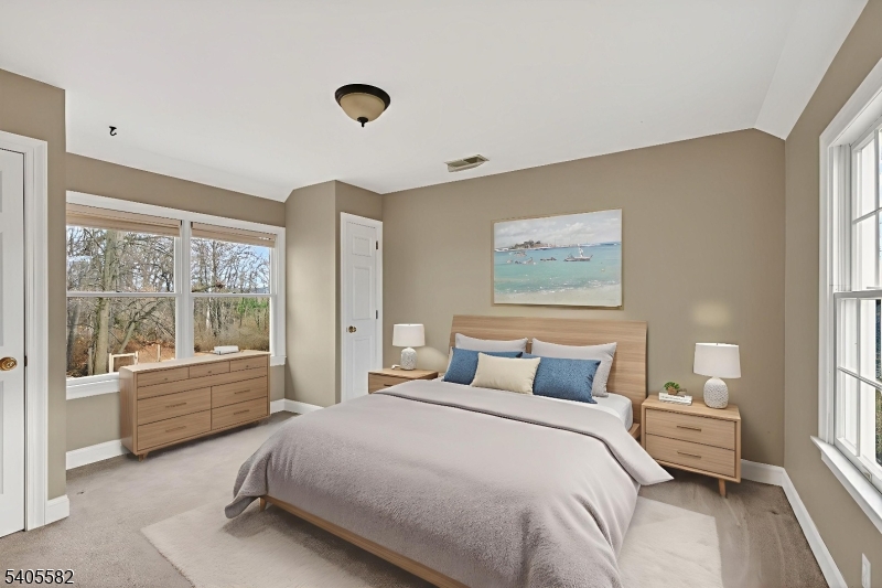 101 Parker Road Bloomsbury, NJ 08804 - Photo 14 of 29 a bedroom with a large bed and a large window