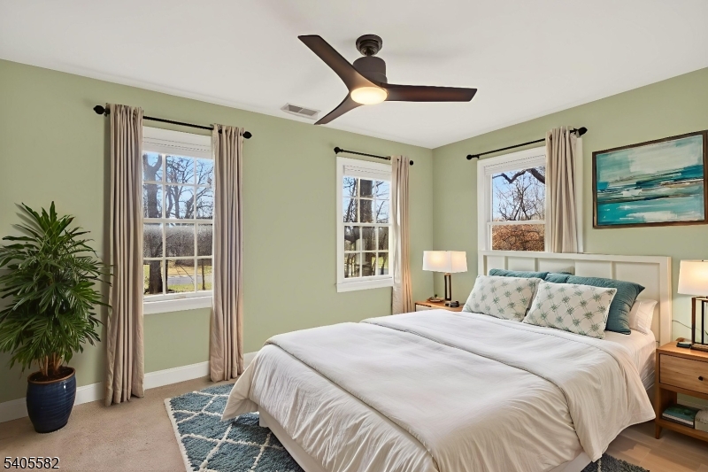 101 Parker Road Bloomsbury, NJ 08804 - Photo 15 of 29 a bedroom with a large bed and a window