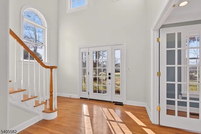 a living room with furniture and windows