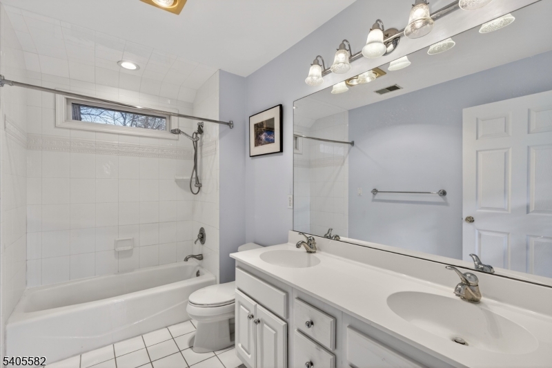 101 Parker Road Bloomsbury, NJ 08804 - Photo 21 of 29 a bathroom with a sink a toilet and shower