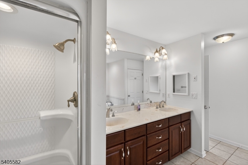 101 Parker Road Bloomsbury, NJ 08804 - Photo 22 of 29 a bathroom with a sink vanity tub and shower