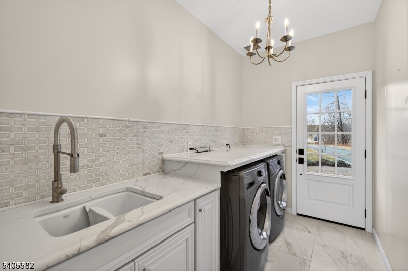 101 Parker Road Bloomsbury, NJ 08804 - Photo 26 of 29 a utility room with sink dryer and washer