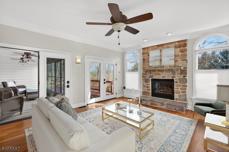 101 Parker Road Bloomsbury, NJ 08804 - Photo 7 of 29 a living room with furniture and a fireplace