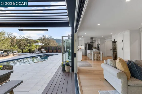 a patio with patio a couch and chairs