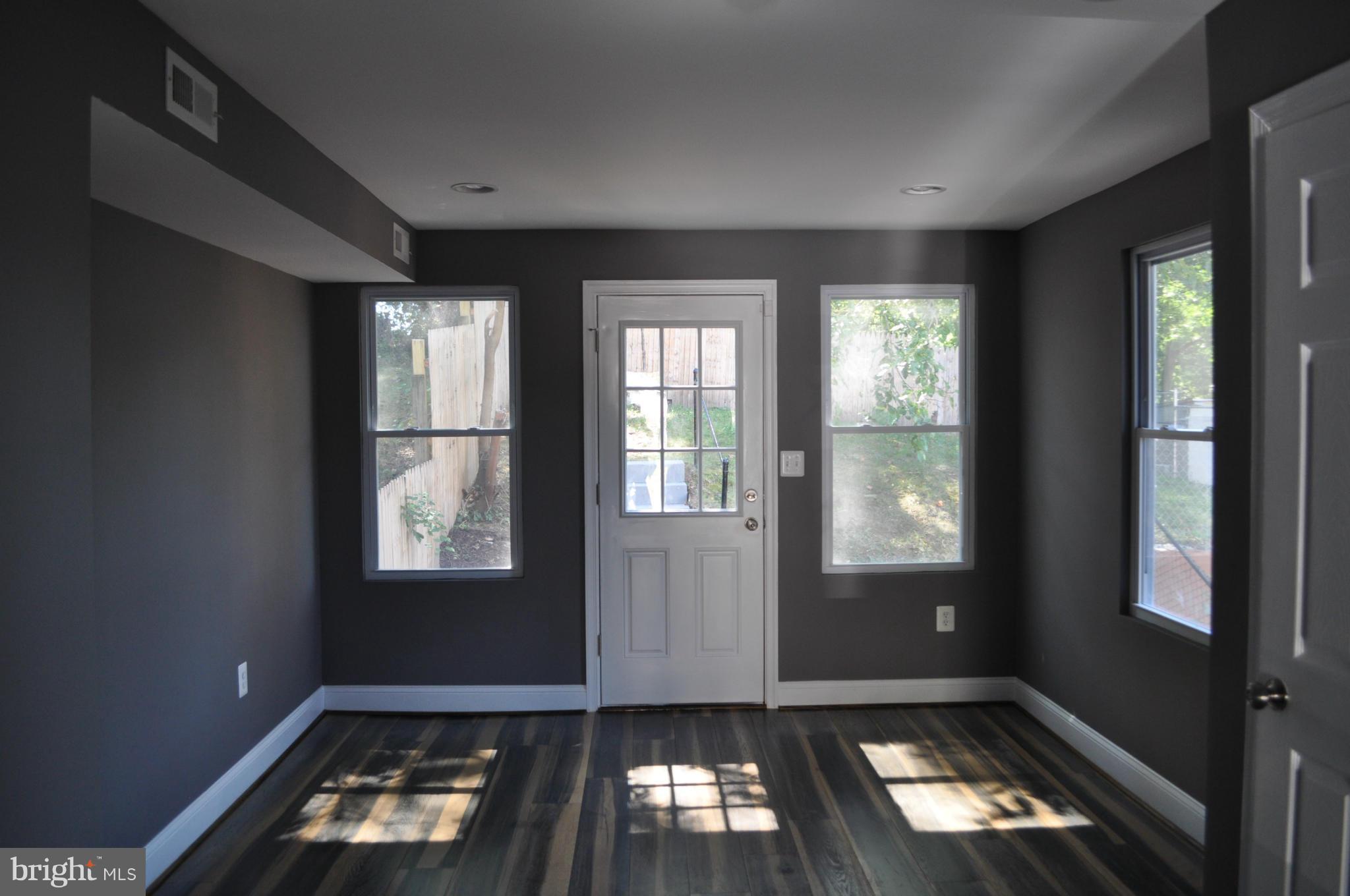 4909 Fitch Place Northeast Washington, DC 20019 - Photo 16 of 30 an empty room with windows