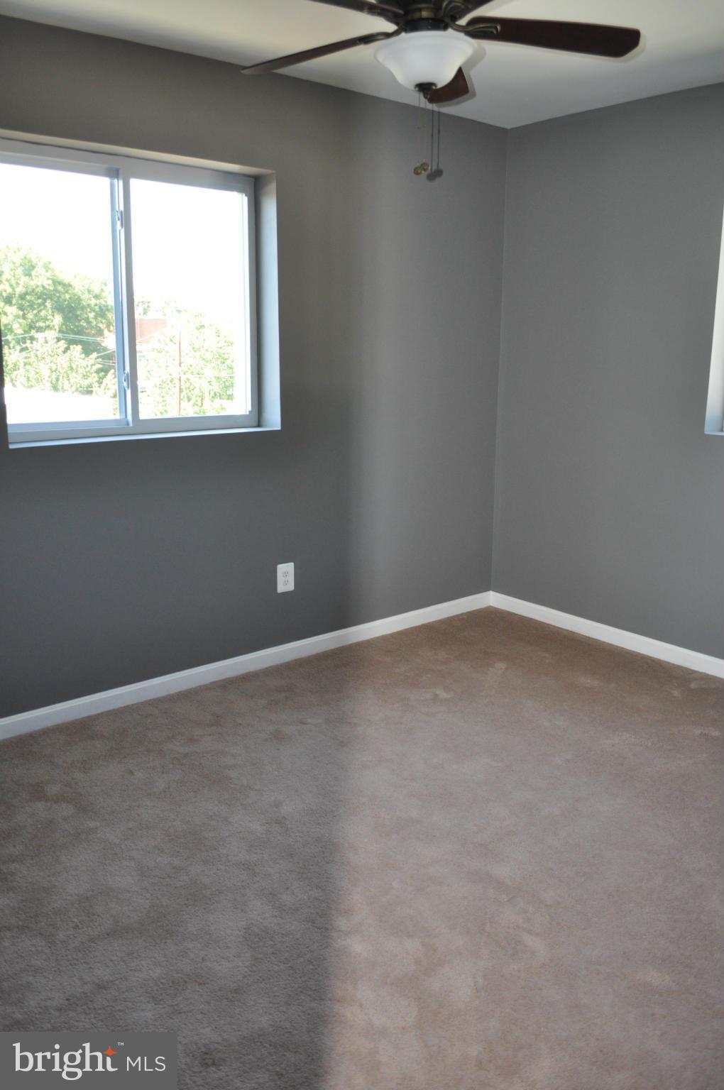 4909 Fitch Place Northeast Washington, DC 20019 - Photo 25 of 30 a view of an empty room with a window