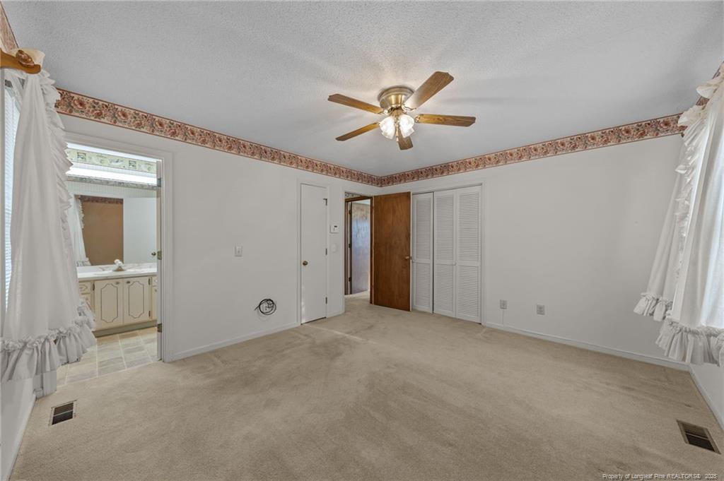 241 Hight Road Aberdeen, NC 28315 - Photo 22 of 48 a view of an empty room with a window