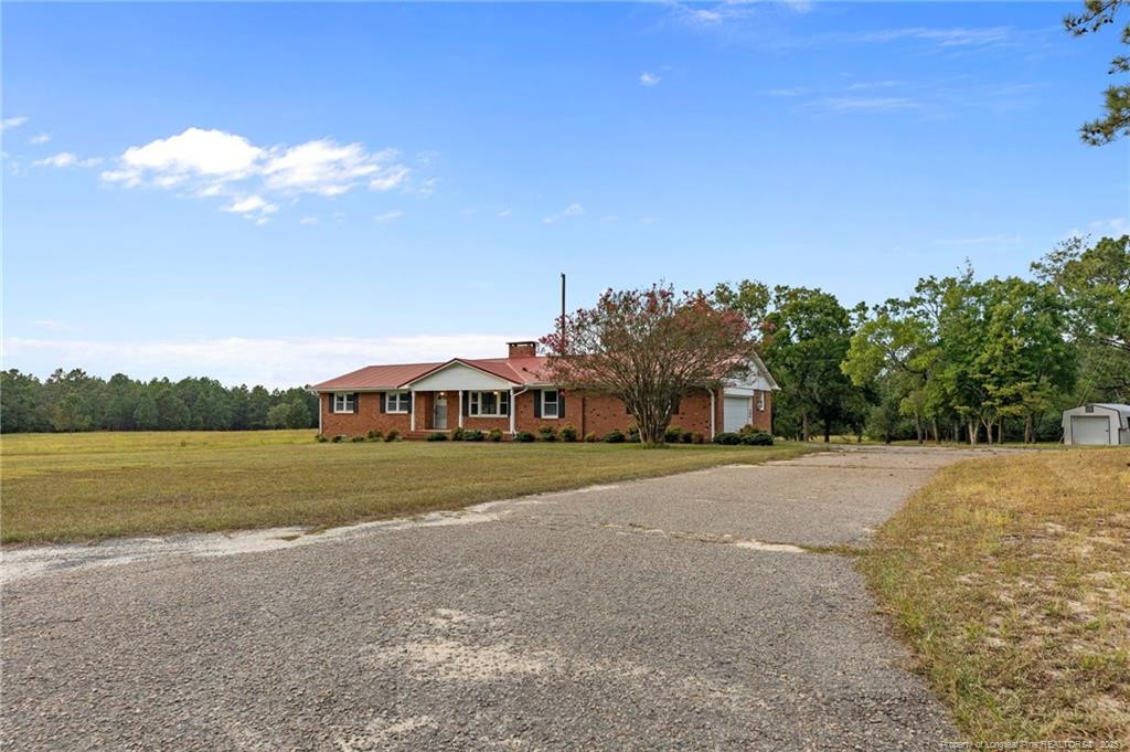 241 Hight Road Aberdeen, NC 28315 - Photo 46 of 48 a view of an outdoor space and city view